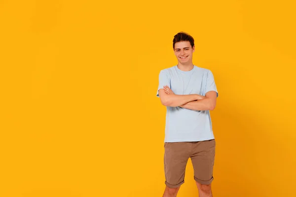 Fashionable Young Student Boy Standing Yellow Studio Background Looking Smiling — Foto Stock