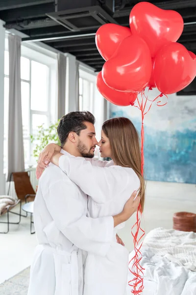 Beautiful Young Couple Celebrating Saint Valentine Day Hotels Bedroom Hugging — Foto de Stock