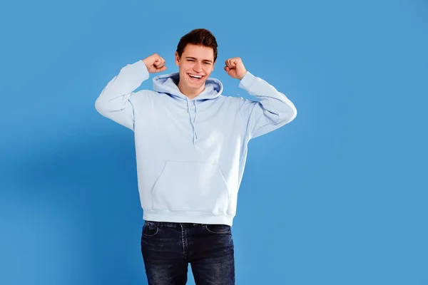 Caucasian Young Male Student Posing Big Smile Blue Studio Background — Stock Photo, Image