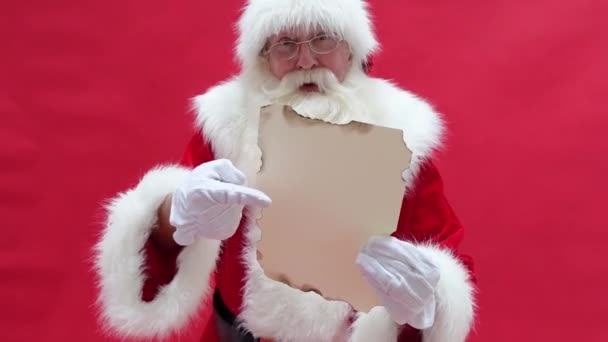 Real Santa Claus Pointing Christmas Letter Red Studio Background Xmas — Stock Video