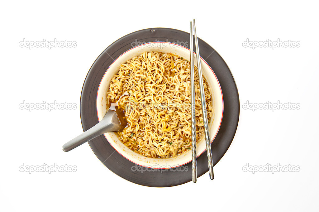 Instant noodle and chopsticks isolated with path on white backgr