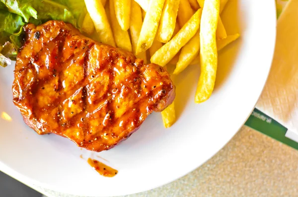 Grilled steak with french fries — Stock Photo, Image