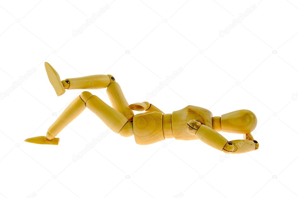 Wooden figure sleeping  isolated on white background 