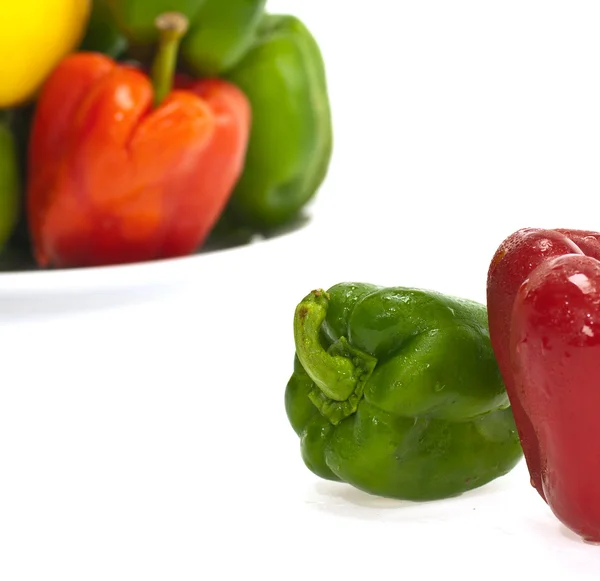 Red green and orange sweet bell peppers isolated on white backgr — Stock Photo, Image