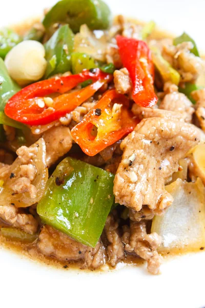 Fried pork with sweet peppers. — Stock Photo, Image