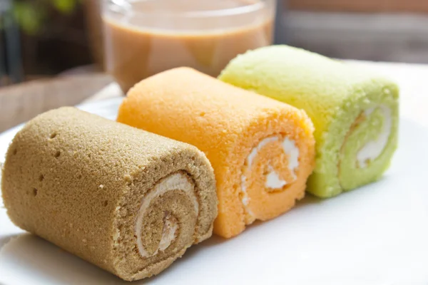 Jam swiss roll cake three flavors. — Stock Photo, Image