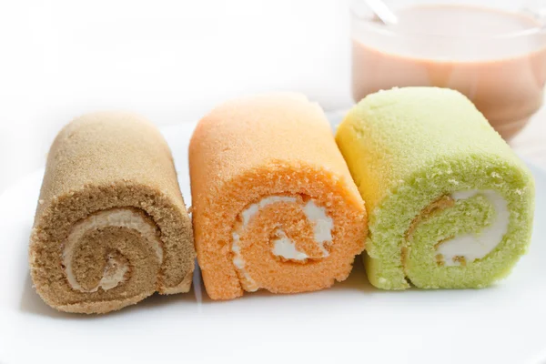 Jam swiss roll cake three flavors. — Stock Photo, Image