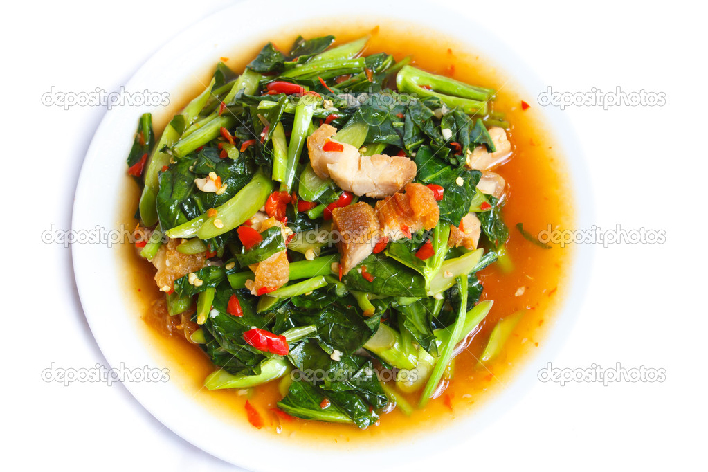 Fried kale with crispy pork, Thai food. — Stock Photo © Tachjang 47335041