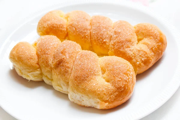 Sweet buns with butter and sugar. — Stock Photo, Image