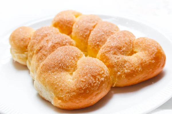 Bollos dulces con mantequilla y azúcar . — Foto de Stock