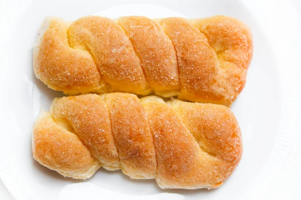 Sweet buns with butter and sugar. — Stock Photo, Image