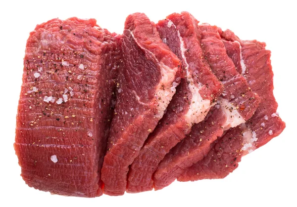 Fresh cuts of raw beef meat with spices — Stock Photo, Image