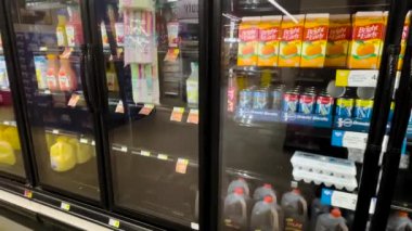 Hephzibah, Ga USA - 01 14 22: KJs Retail grocery store out of stocks in orange juice section