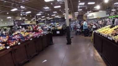 Grovetown, Ga USA - 01 15 22: Georgia snow scare Kroger retail grocery store crowds of people in produce