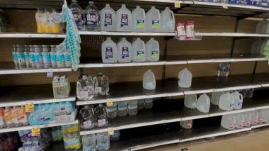 Grovetown, Ga USA - 01 15 22: Georgia snow scare Kroger retail grocery pan of hard shopped water aisle
