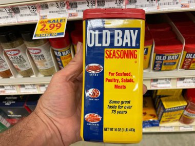 Grovetown, Ga USA - 03 20 22: Retail store Spices hand holding Old Bay seasoning