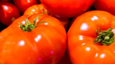 Grovetown, Ga USA - 05 13 22: Giant lush fresh tomatoes on display in a retail store