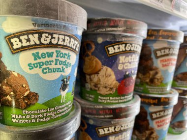 Grovetown, Ga USA - 05 18 22: Ben and Jerry's Ice Cream retail store shelf side view cariety
