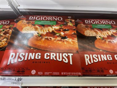 Grovetown, Ga USA - 05 10 22: DiGiorno ferozen pizza on retail store shelf price tag rising crust