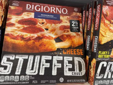 Grovetown, Ga USA - 05 10 22: DiGiorno ferozen pizza on retail store shelf close up