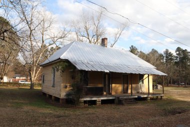 Augusta, Ga USA - 01 25 21: Old vintage retro home with a silver tin roof
