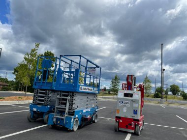 Augusta, Ga USA - 05 07 22: Scissor lift in a parking lot back view