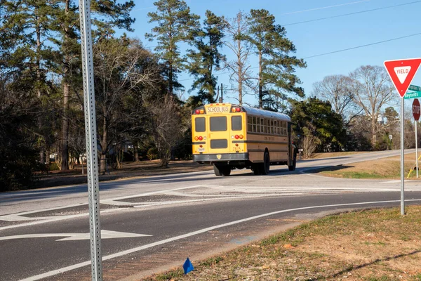 Augustam Usa Yellow School Bus Drives Road Back View — Foto Stock