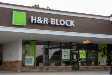Augusta, Ga USA - 07 25 21: H R retail tax office block building sign and entrance