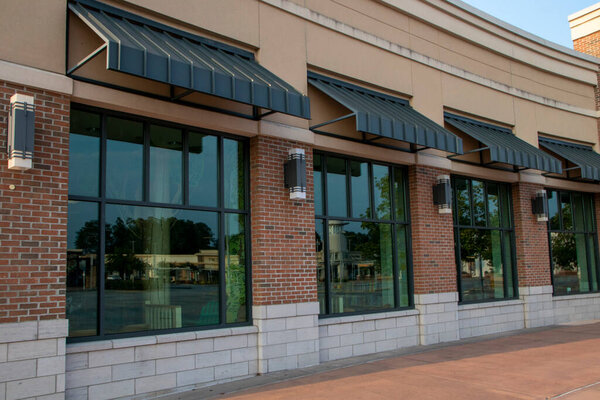 Augusta, Ga USA - 07 25 21: Augusta Mall retail exterior modern windows and brick facade