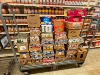 Grovetown, Ga USA - 07 24 22: Retail grocery store a cart of warehouse stock case goods
