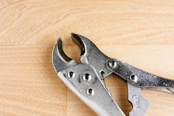 Vice Grips on wood — Stock Photo, Image