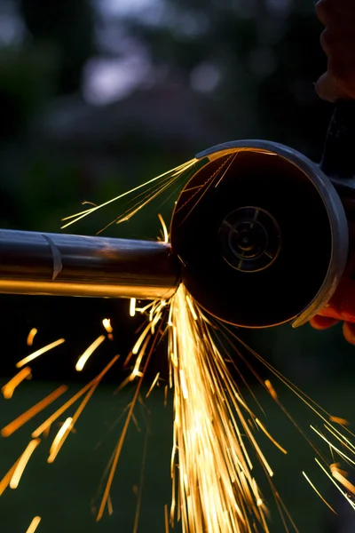 Sparks while grinding iron — Stock Photo, Image