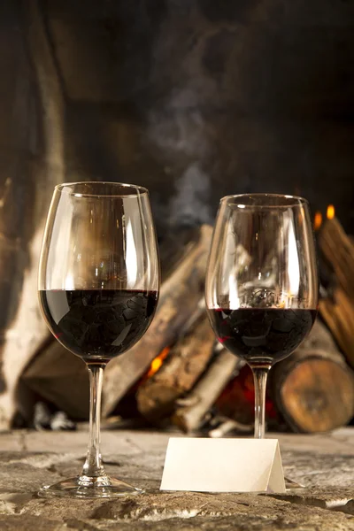 Wine by the fireplace — Stock Photo, Image