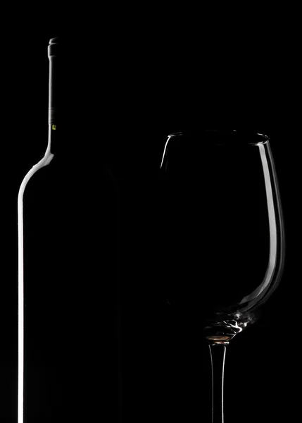 Garrafa de vinho e copo de vinho — Fotografia de Stock