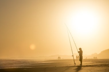 gün batımında balık adam