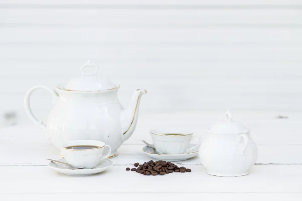 Two cups of coffee and beans — Stock Photo, Image