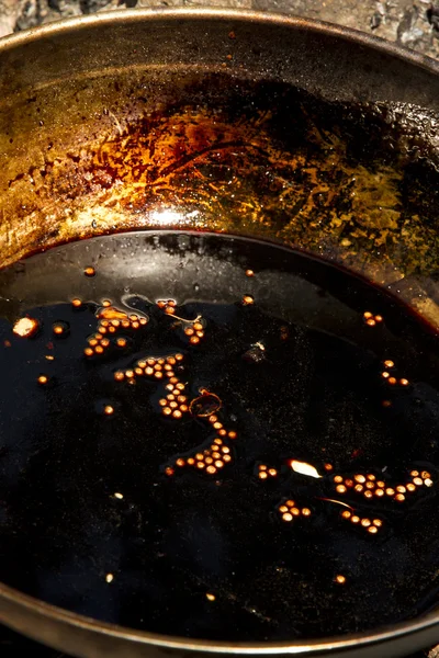 Sauce on wok — Stock Photo, Image