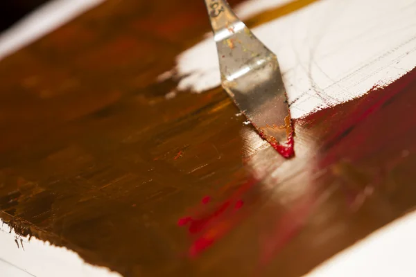 Oil colors mix with spatula — Stock Photo, Image