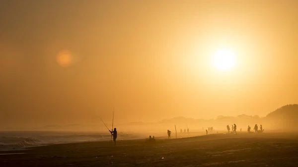 Západ slunce na pláži Stock Obrázky