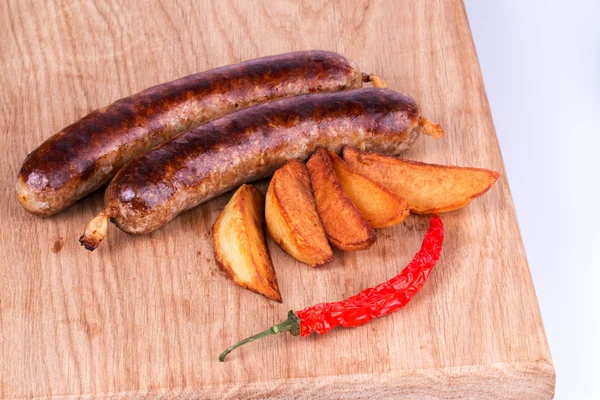 Salsiccia e patate . — Foto Stock