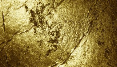 Grunge altın folyo dokusu çatlaklar ve çizikler ile arka plan