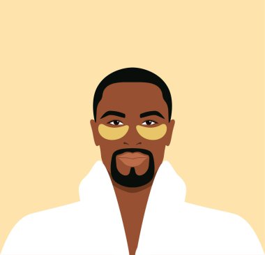 Yüzünde altın göz bantları olan beyaz bornozlu sakallı Afrikalı bir adam. Günlük cilt bakımı