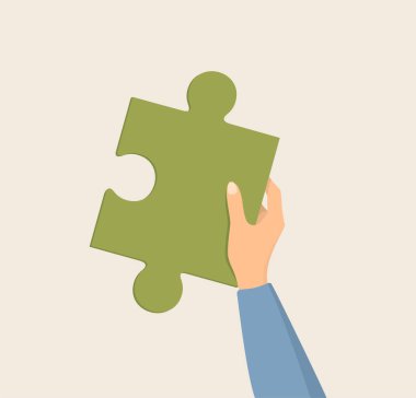 A female hand in a blue sleeve holding an orange puzzle piece on a beige background. Flat vector illustration