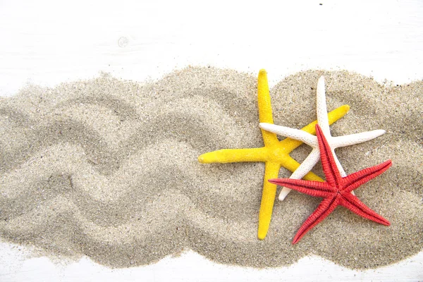 Peixes estrelados na areia — Fotografia de Stock