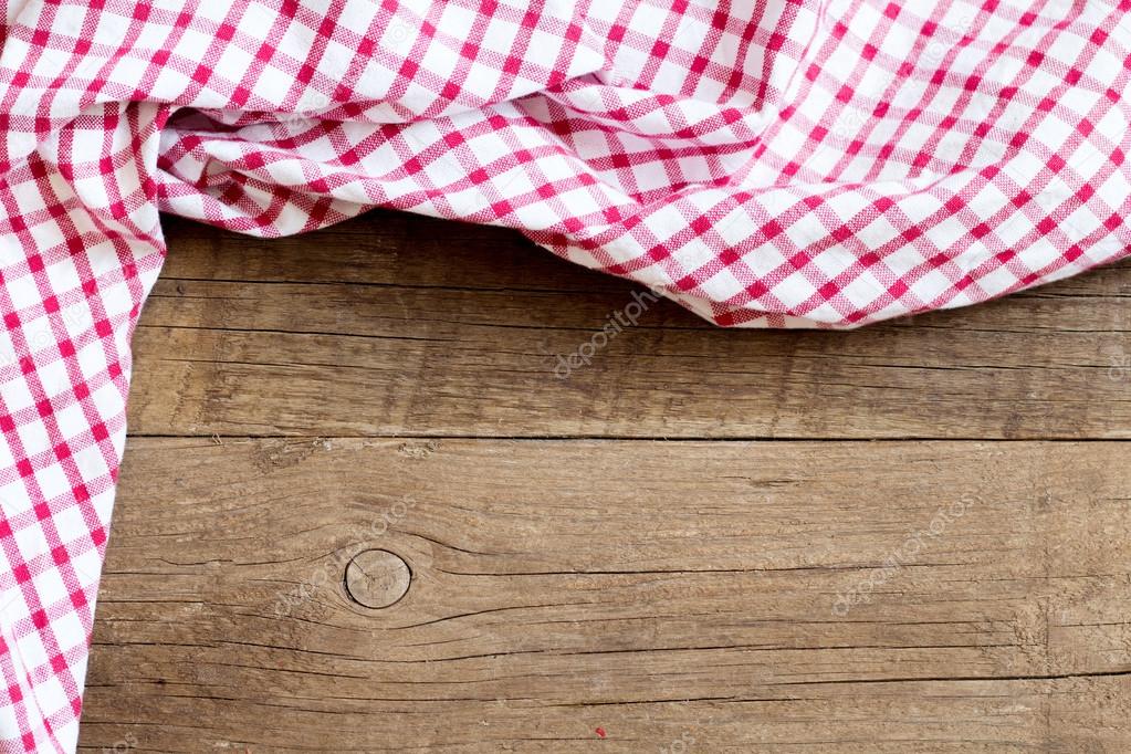Checkered tablecloth on wooden table