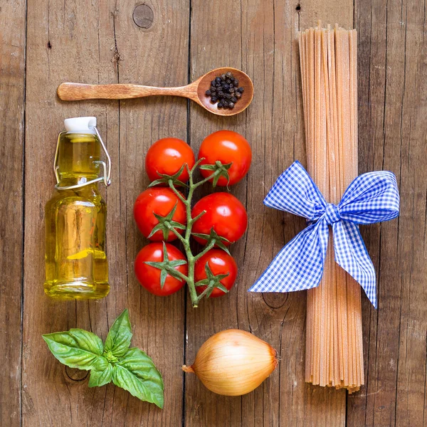 Ingridients for pasta with tomato sauce — Stock Photo, Image