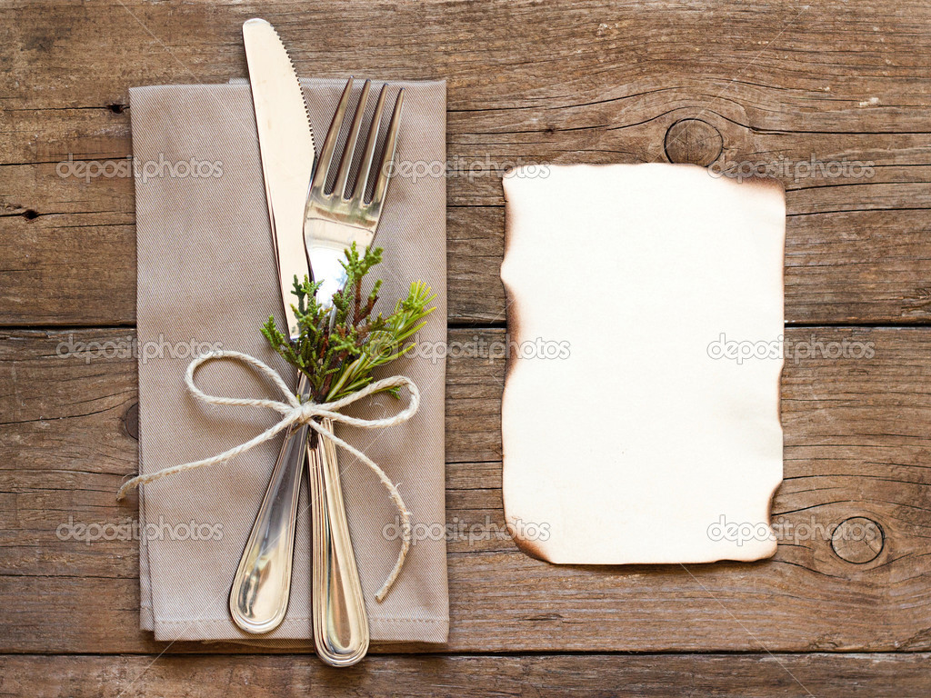 Rustic Table setting and old burned paper