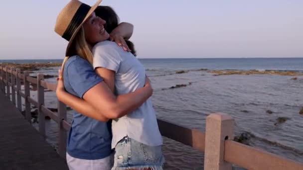 Middle Age Mother Her Teen Daughter Hugging Wooden Pier Sea — Stock Video