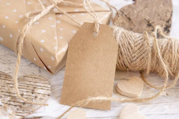 Valentines Wrapped Present Vertical Kraft Paper Gift Tag Hanging Rope — Zdjęcie stockowe