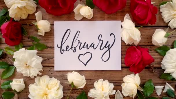 February Card Wooden Table Top View Zoom — Stockvideo